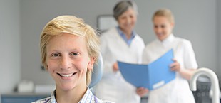 smiling teen at the dentist’s office