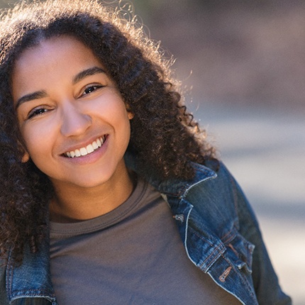 smiling teen in the sunshine (for first section)