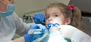 a child undergoing pulp therapy